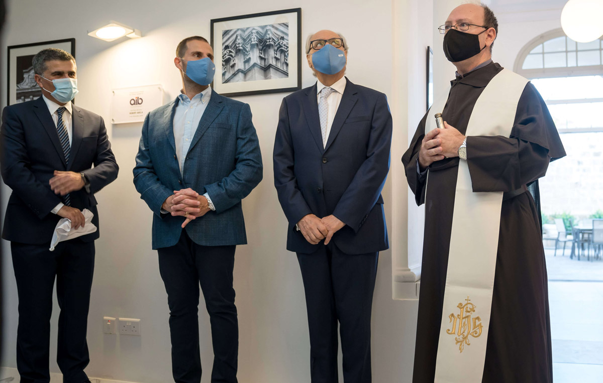 AIB Managing Director Ramon Mizzi, Prime Minister Robert Abela, Minister for Finance and Financial Services Edward Scicluna and Father Maurice Abela O.Carm, during the blessing of the office